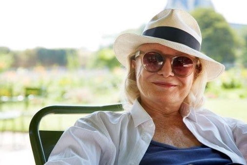 older lady with sunglasses & hat needing Part-Time Support Worker