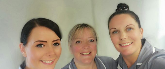 3 smiling Premier Homecare carers