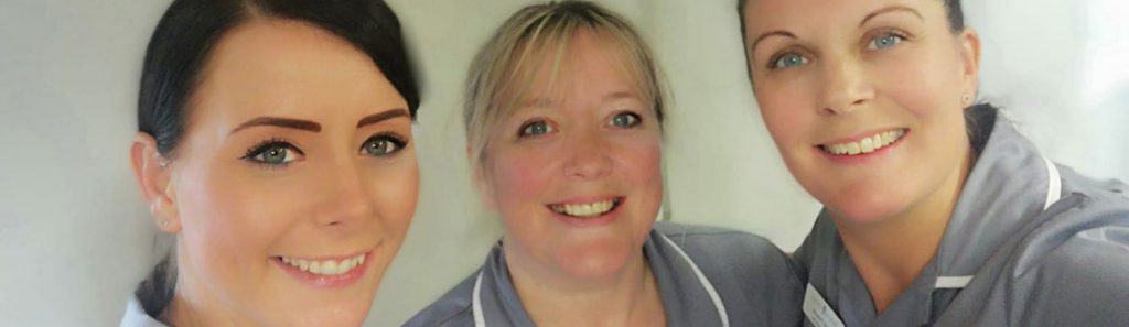 3 smiling Premier Homecare carers