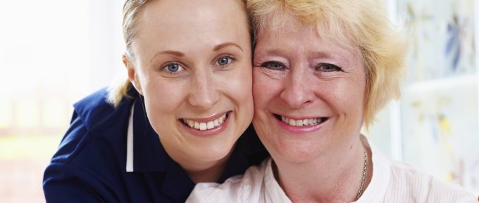 close up Portrait of senior woman with care worker